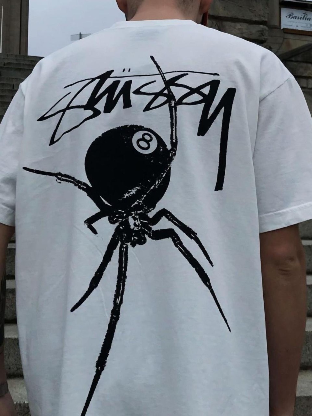 Stussy White T-Shirt with Black Spider and Logo Back Graphic